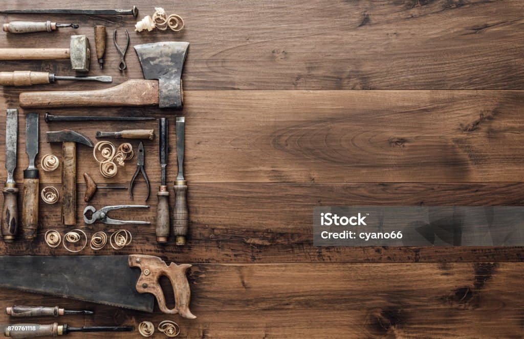 Carpenter tools on a wooden workbench